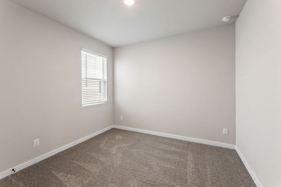 Representative unfurnished interior of a home built from the Pecos by Hakes Brothers in Highland Ridge, New Braunfels (Image 33).