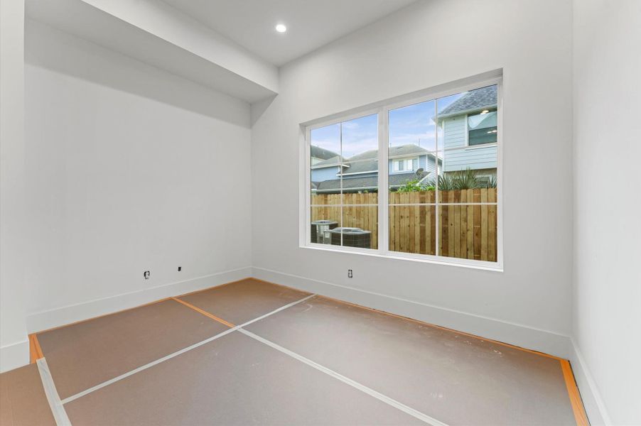 The dining room is adjacent to the kitchen.