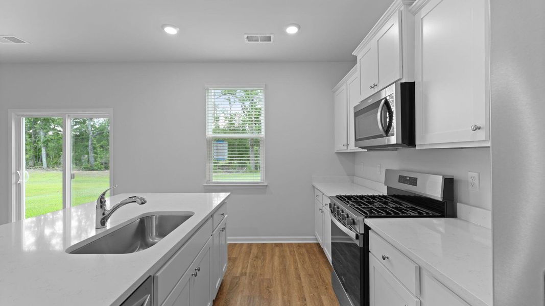 Furnished interior view inside a new home in Pineview North, Summerville (Image 6).