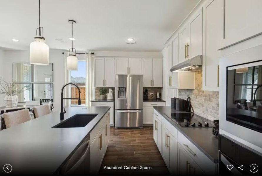Interior photos- Photo of Pulte model home with same floor plan, not of actual home listed.