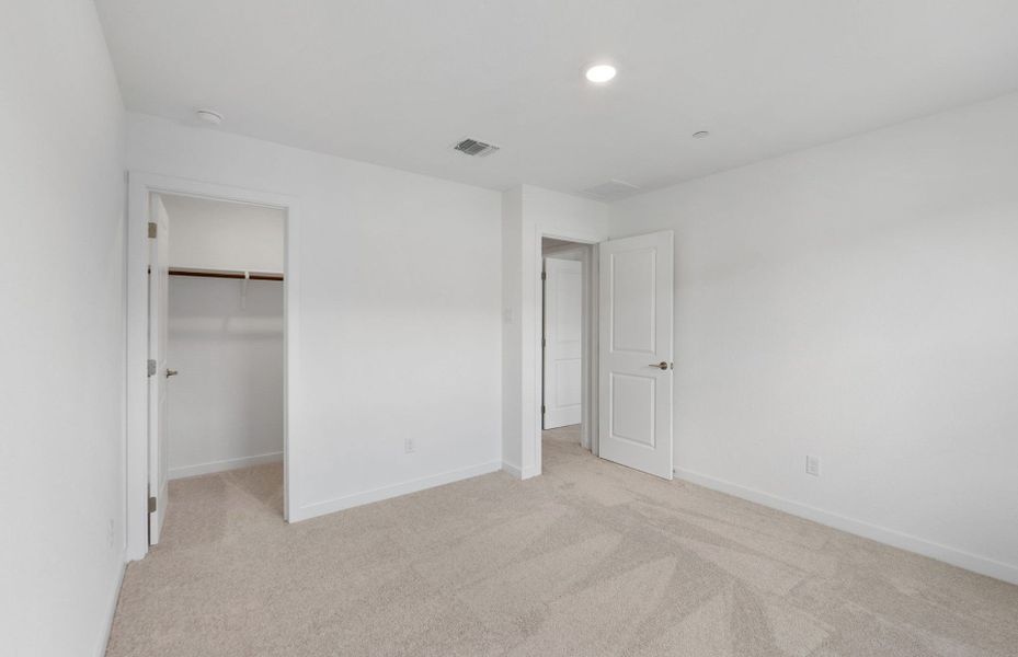 Spacious, unfurnished interior of a new home in Monarch on Main, Round Rock (Image 15). Spacious, unfurnished interior of a new home in Monarch on Main, Round Rock (Image 15).