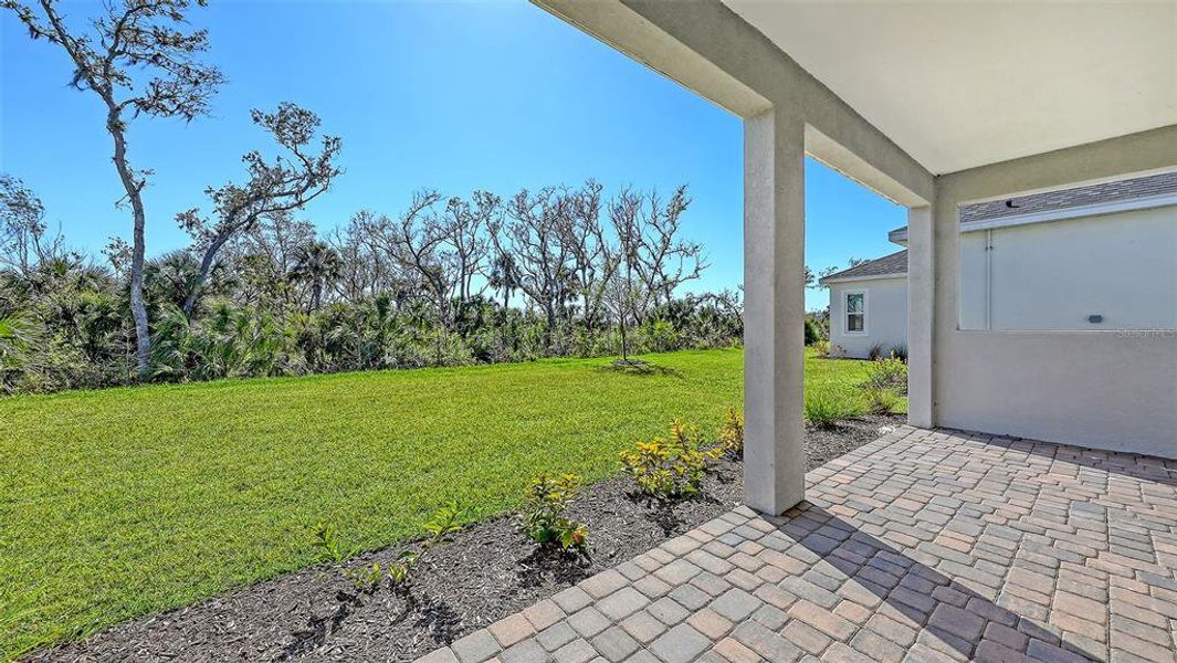 Exterior details and patio area of a home in Wildleaf, Parrish (Image 3). Exterior details and patio area of a home in Wildleaf, Parrish (Image 3).