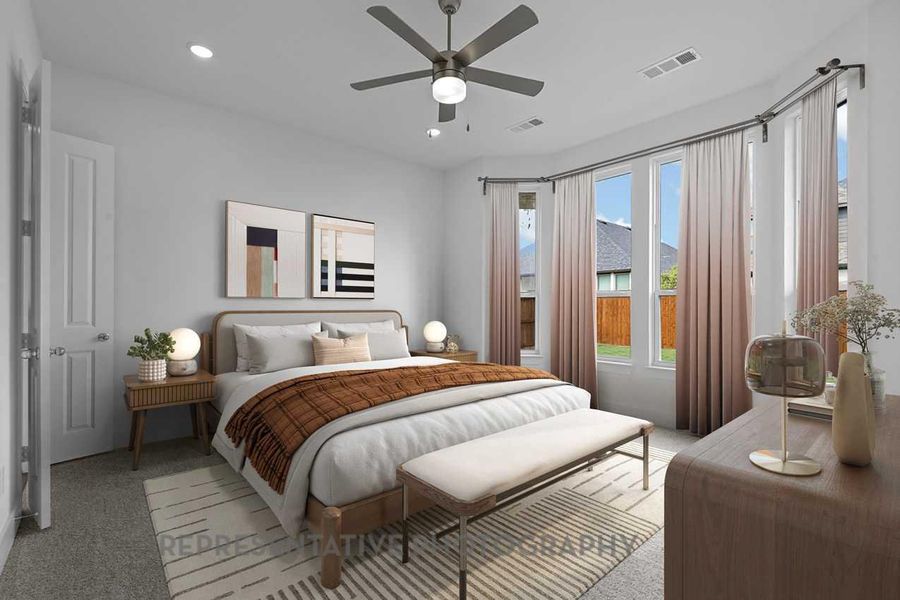 Bedroom featuring light colored carpet, visible vents, ceiling fan, and recessed lighting Bedroom featuring light colored carpet, visible vents, ceiling fan, and recessed lighting