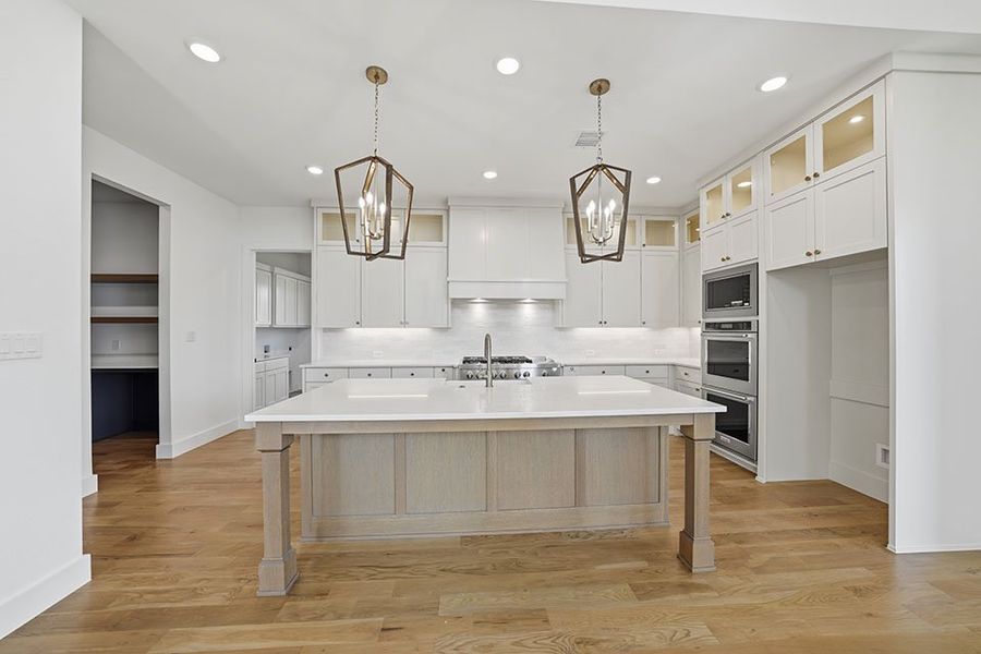 Furnished interior view inside a new home in Light Farms Graham/Reagan, Celina (Image 7).