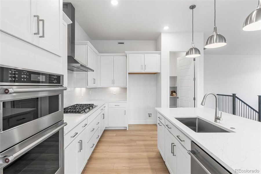 Furnished interior view inside a new home in Hilltop at Inspiration, Aurora (Image 7).