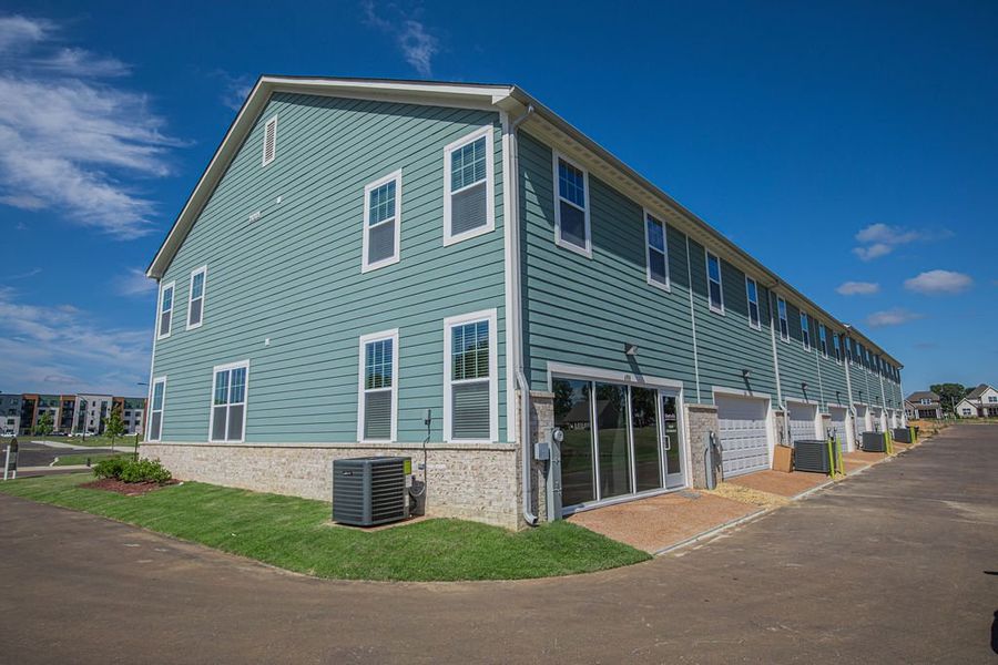 Representative exterior photo of a completed home built from the Provost by Grant & Co in The Townhomes at Union Depot, Bartlett, TN (Image 21).