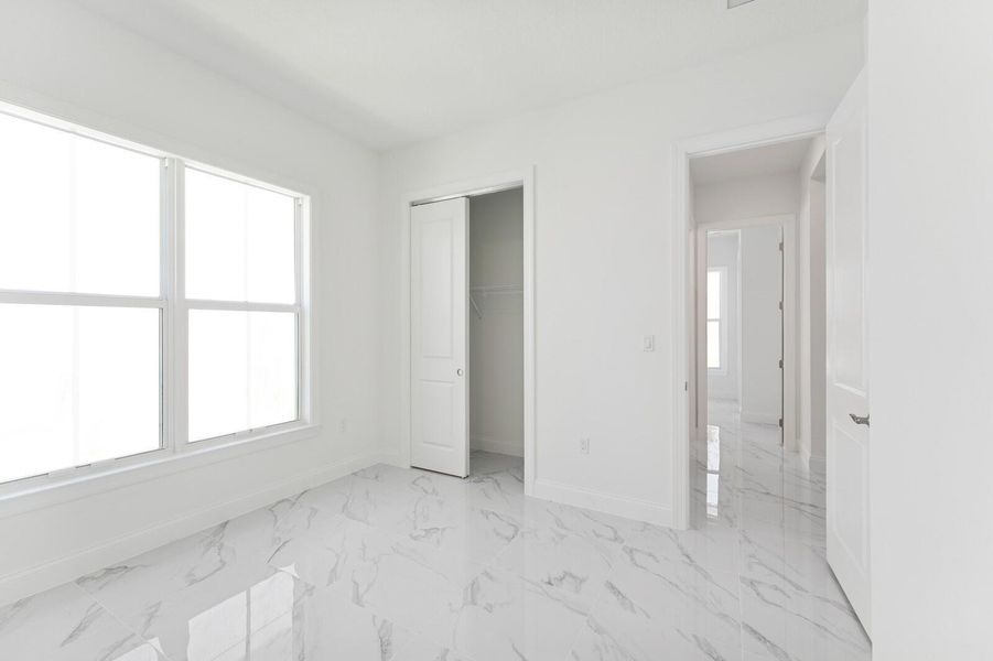 Furnished interior view inside a new home in Salerno Reserve - Single Family, Stuart (Image 34). Furnished interior view inside a new home in Salerno Reserve - Single Family, Stuart (Image 34).