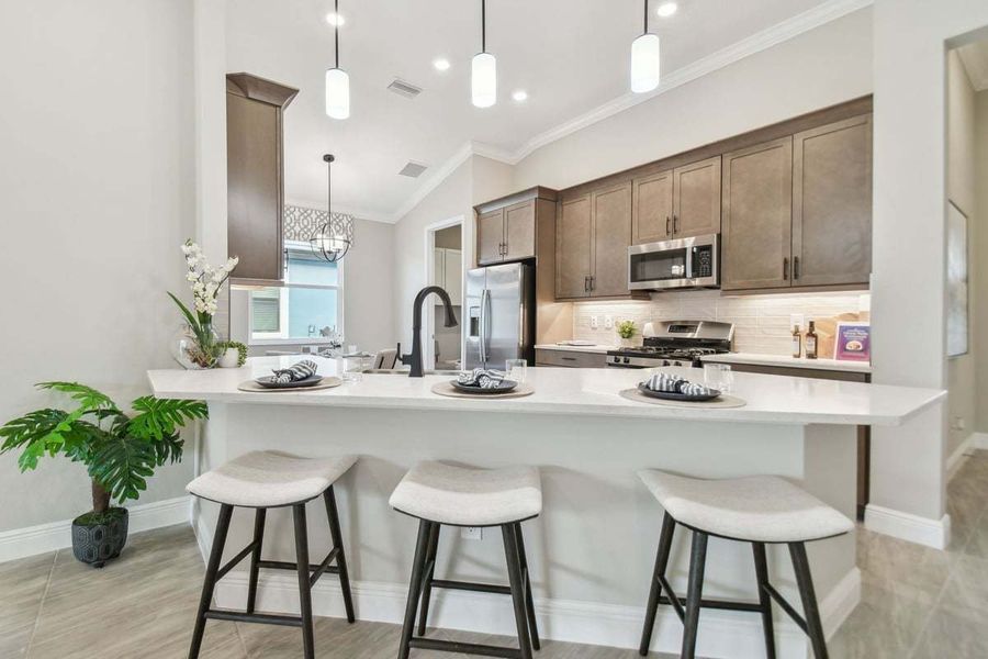 Representative furnished interior of a home built from the 50' Sweetwater by William Ryan Homes in Tamarack at Two Rivers, Zephyrhills (Image 38).
