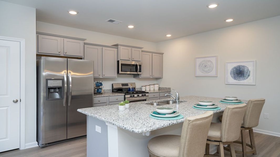 Representative furnished interior of a home built from the KERRY by D.R. Horton in Lochaven, Conway (Image 16).