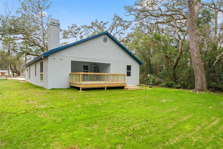 Exterior details and patio area of a home in , Brooksville (Image 12).