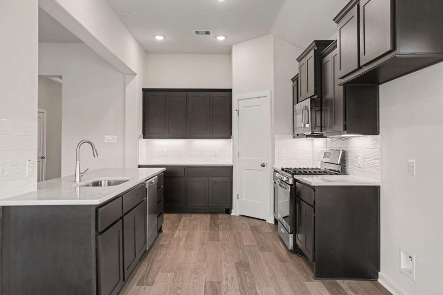 Furnished interior view inside a new home in Clear View Estates, Willis (Image 8).