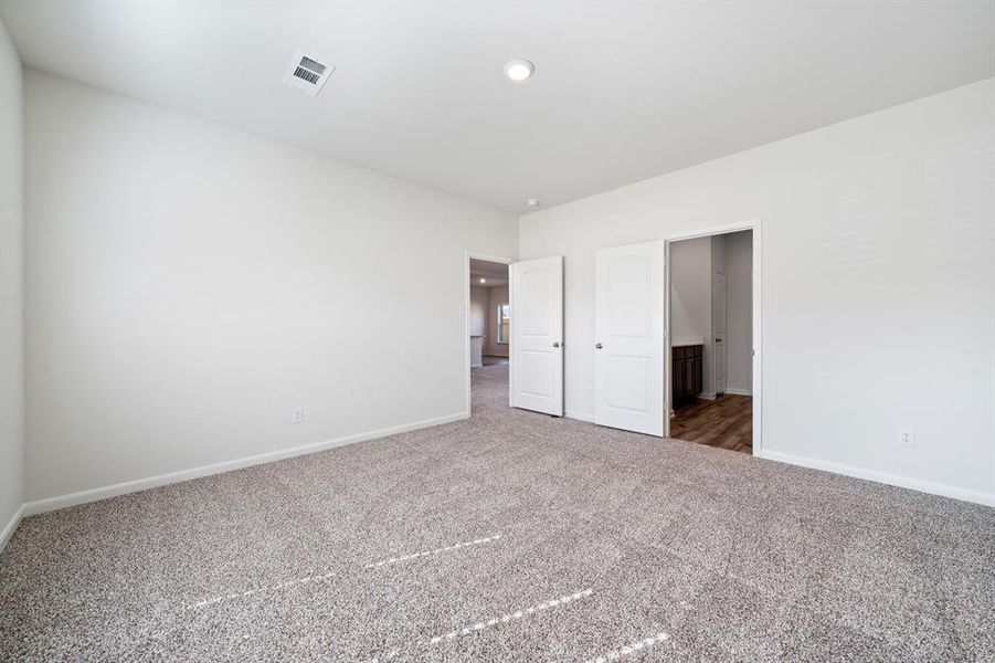 Unfurnished bedroom featuring carpet floors