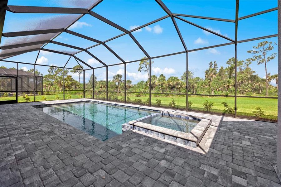 Exterior details and patio area of a home in Calusa Country Club, Lakewood Ranch (Image 25).