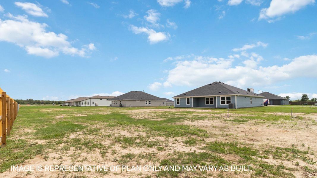 Exterior details and patio area of a home in Railhead, Cedar Creek (Image 18).