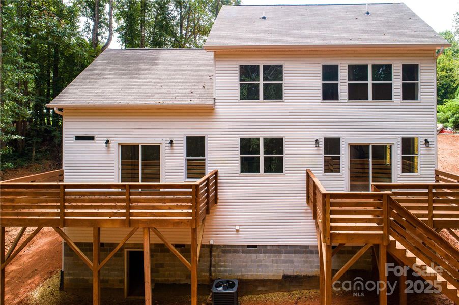 Front exterior of a new home in , Hickory, NC, highlighting curb appeal (Image 16).