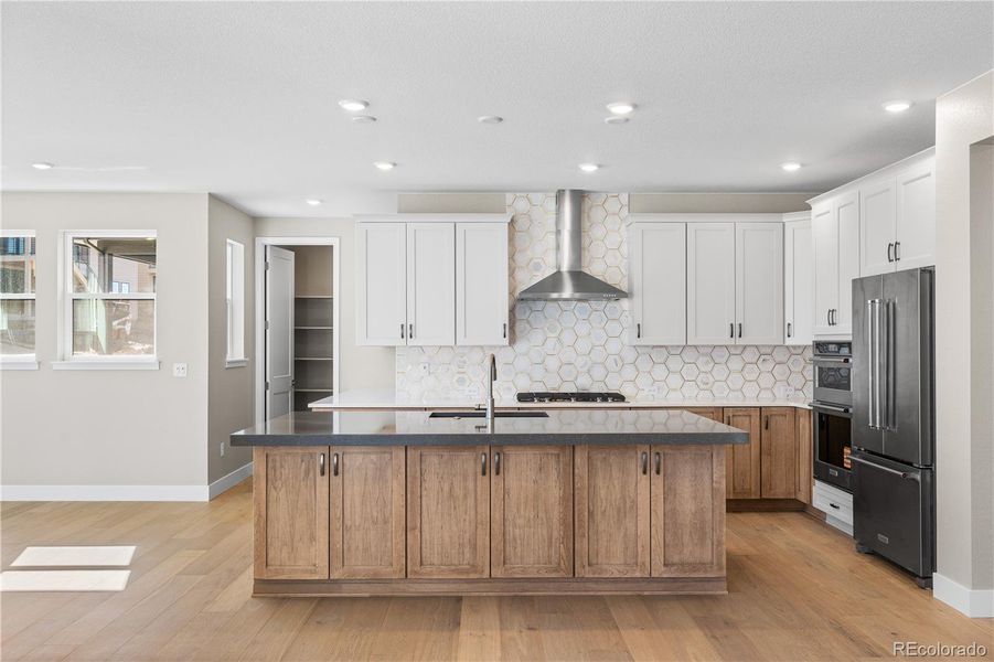 Furnished interior view inside a new home in Legends at Lyric, Lone Tree (Image 6).