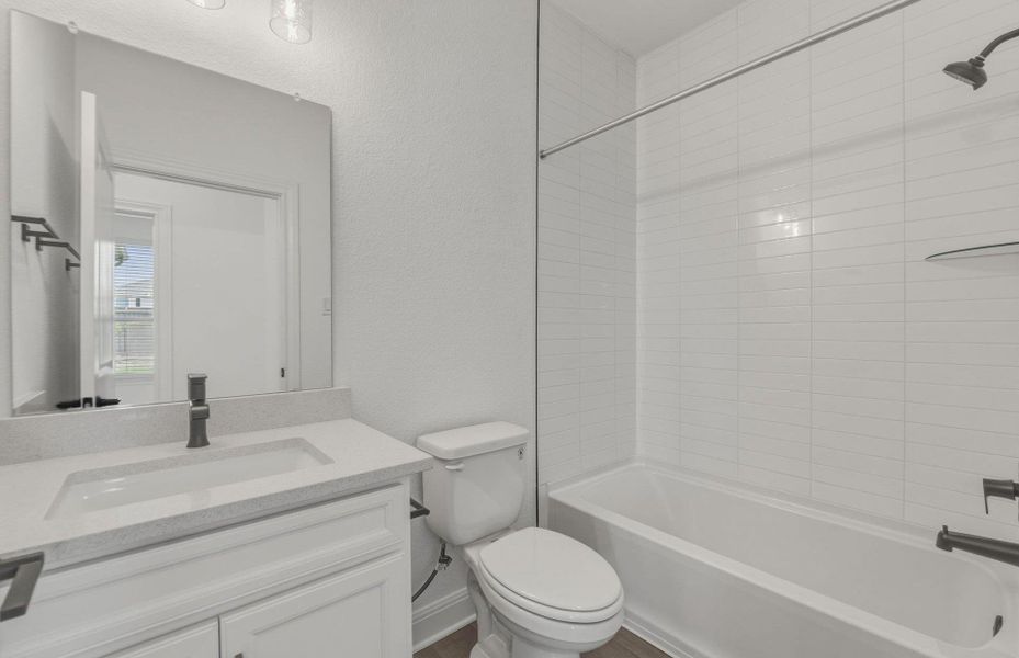 Furnished interior view inside a new home in Horizon Lake, Leander (Image 9).