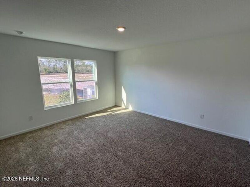 Spacious, unfurnished interior of a new home in Sawmill Branch, Palm Coast (Image 20).
