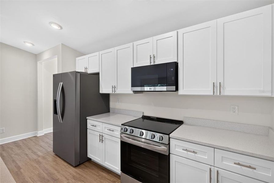 Furnished interior view inside a new home in , Port Charlotte (Image 10).