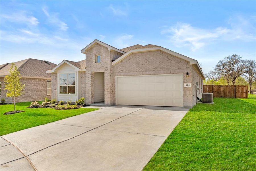Front exterior of a new home in , Cleburne, TX, highlighting curb appeal (Image 15). Front exterior of a new home in , Cleburne, TX, highlighting curb appeal (Image 15).