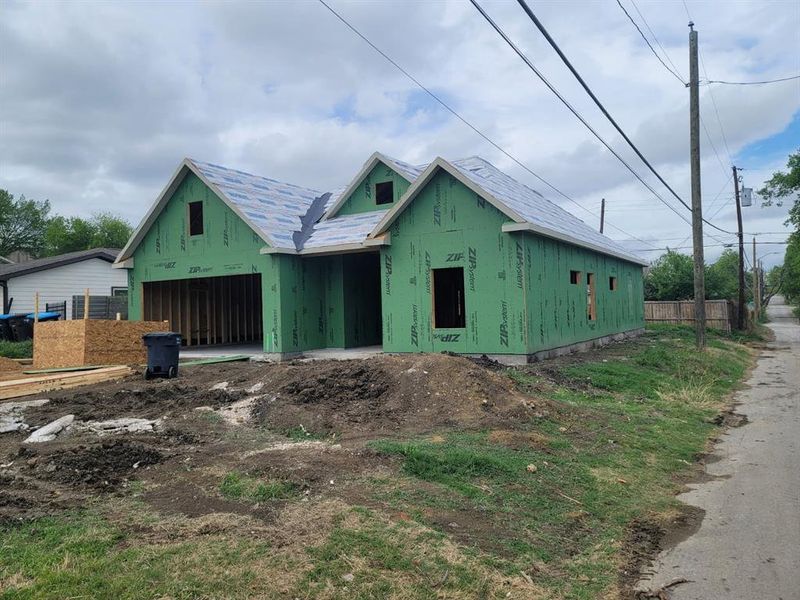 Unfinished property with a garage
