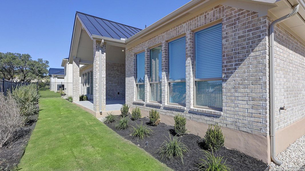 Exterior details and patio area of a home in The Dominion 70', San Antonio (Image 2). Exterior details and patio area of a home in The Dominion 70', San Antonio (Image 2).