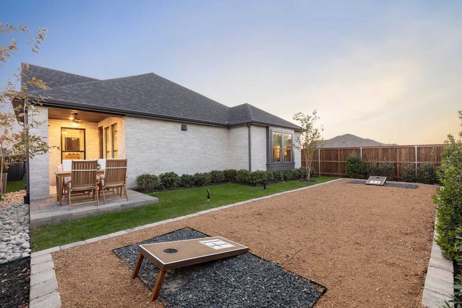 Representative exterior details of a home built from the Monet-SS by Highland Homes in Lariat, Liberty Hill (Image 32).