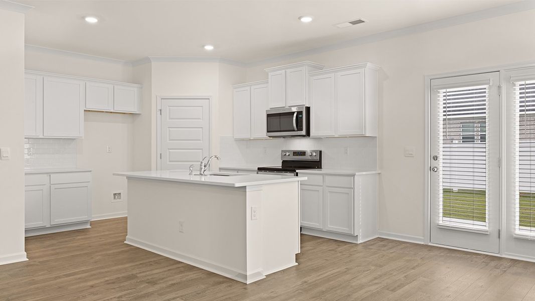Furnished interior view inside a new home in Independence Villas and Townhomes, Loganville (Image 5).