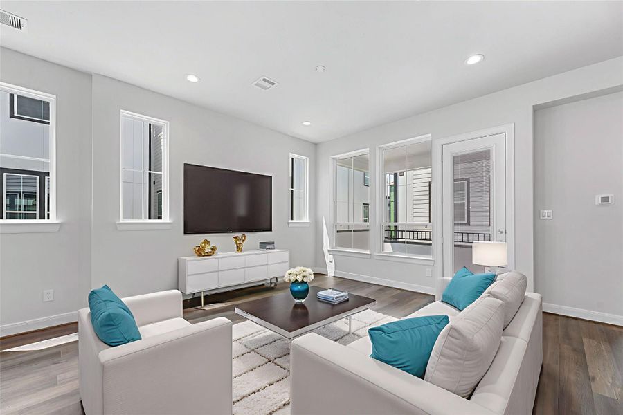 Furnished interior view inside a new home in The Corner At Buffalo Pointe, Houston (Image 7).