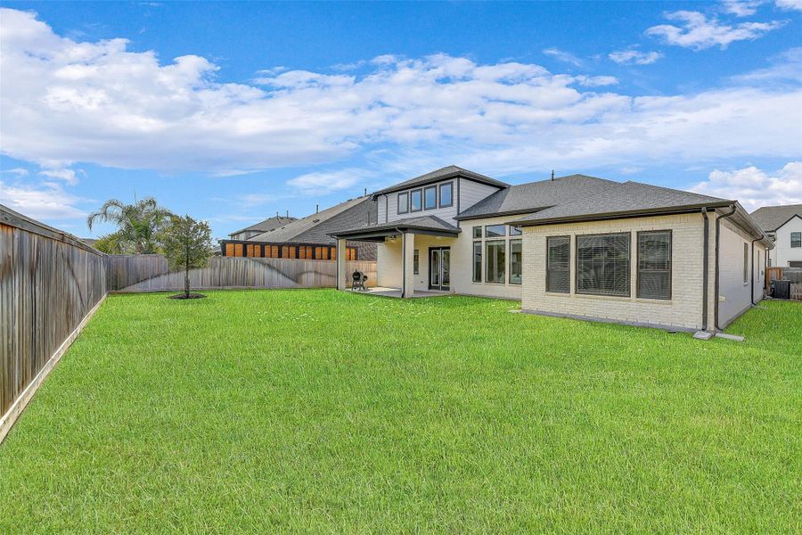 Exterior details and patio area of a home in Bridgeland 45', 50', 70', Cypress (Image 4). Exterior details and patio area of a home in Bridgeland 45', 50', 70', Cypress (Image 4).