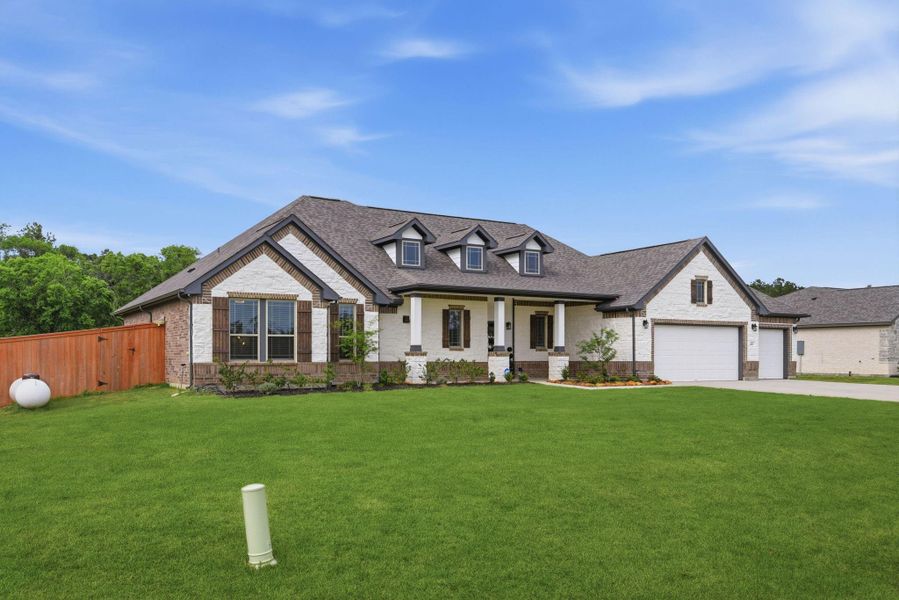 Front exterior of a new home in , Cleveland, TX, highlighting curb appeal (Image 22).