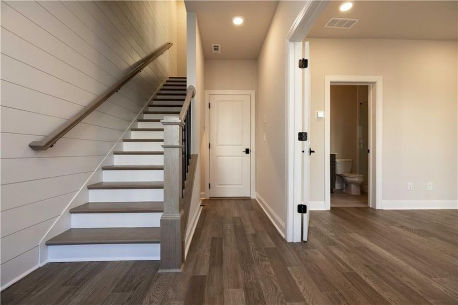 Step into a welcoming foyer with soaring ceilings and statement lighting that sets the tone for the entire home. These photos are from another community and are not representative of this homesite. Step into a welcoming foyer with soaring ceilings and statement lighting that sets the tone for the entire home. These photos are from another community and are not representative of this homesite.