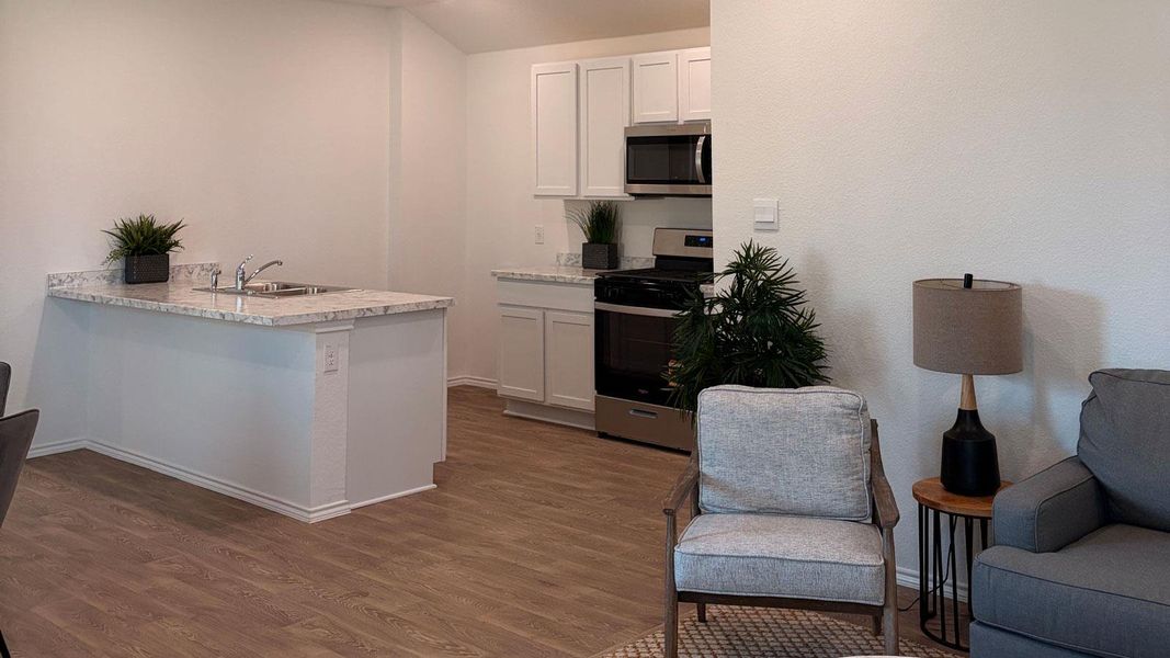 Furnished interior view inside a new home in Valverde, Bastrop (Image 9).