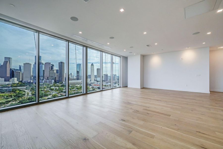 Downtown and Bayou views. Spacious living area includes surround sound, engineered hard wood flooring, custom art lighting through out, solar shades, media projector and screen. Downtown and Bayou views. Spacious living area includes surround sound, engineered hard wood flooring, custom art lighting through out, solar shades, media projector and screen.
