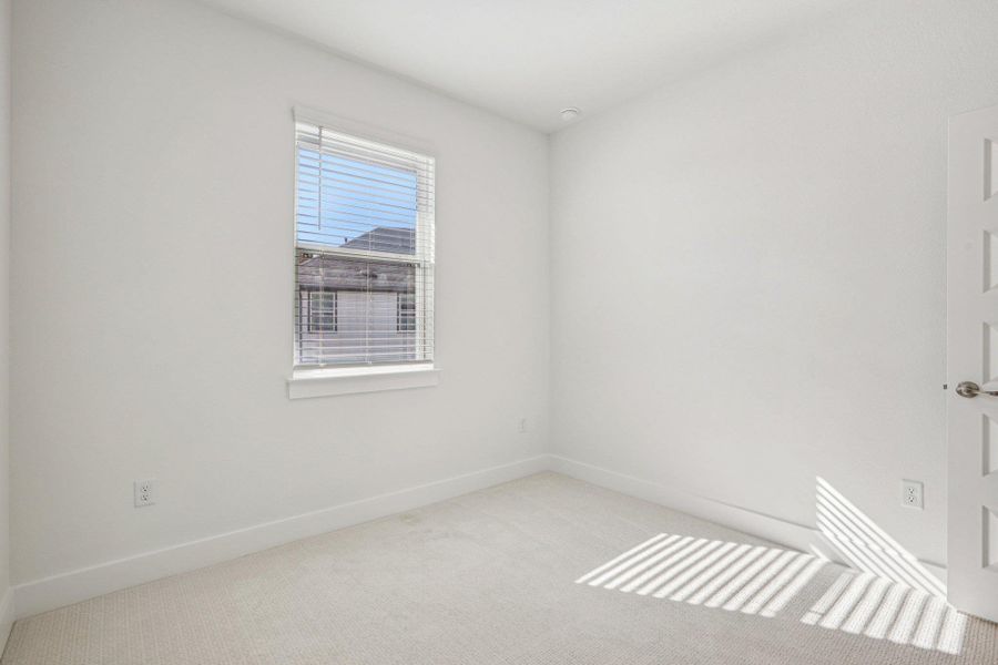 Spacious, unfurnished interior of a new home in Koenig Townhomes, Austin (Image 30).