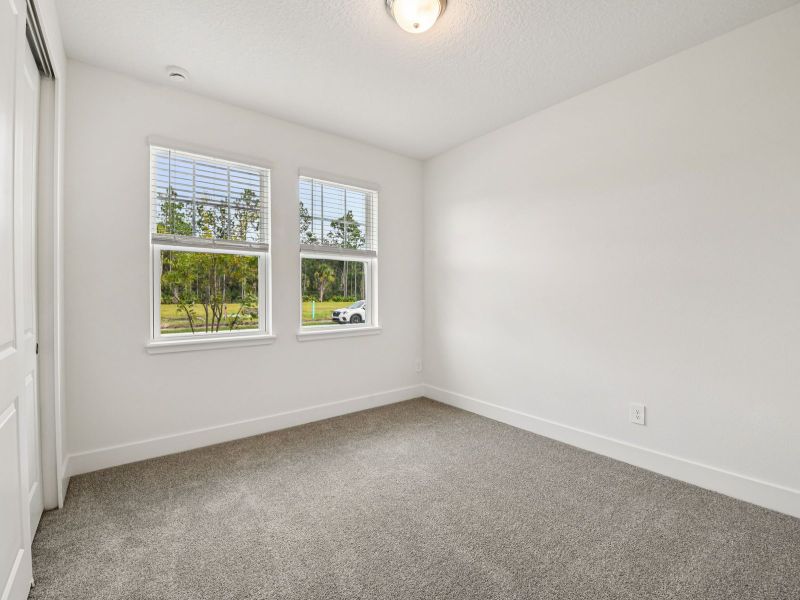 Spacious, unfurnished interior of a new home in Legends Preserve - Signature Series, Daytona Beach (Image 11).