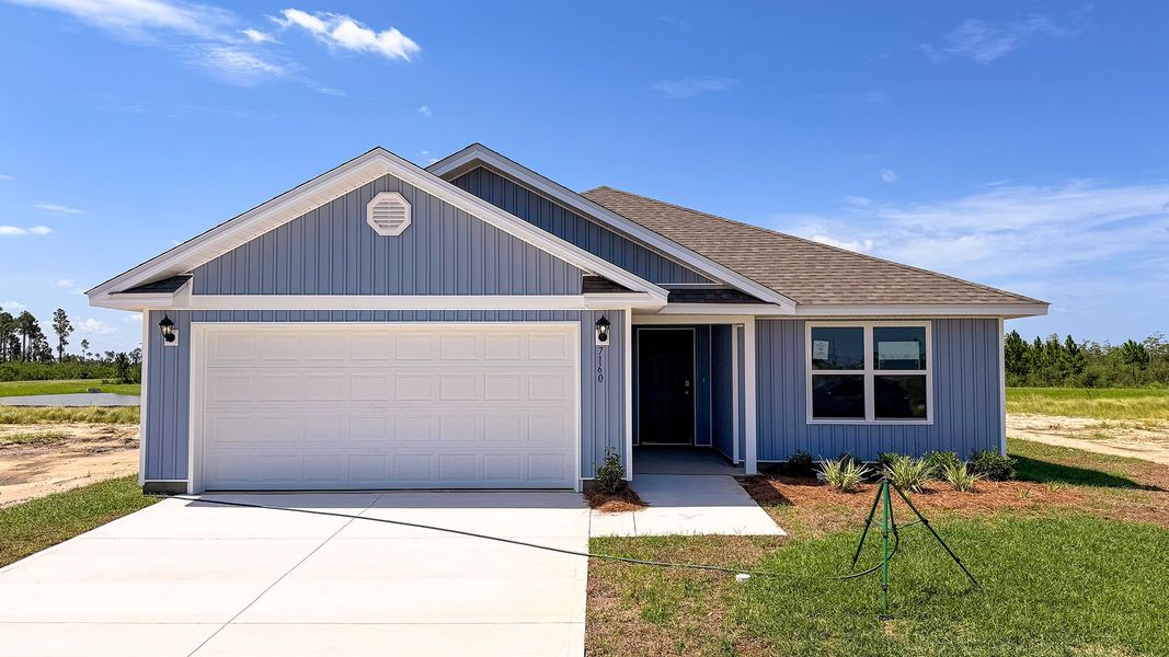 Front exterior of a new home in Liberty, Panama City, FL, highlighting curb appeal (Image 1). Front exterior of a new home in Liberty, Panama City, FL, highlighting curb appeal (Image 1).