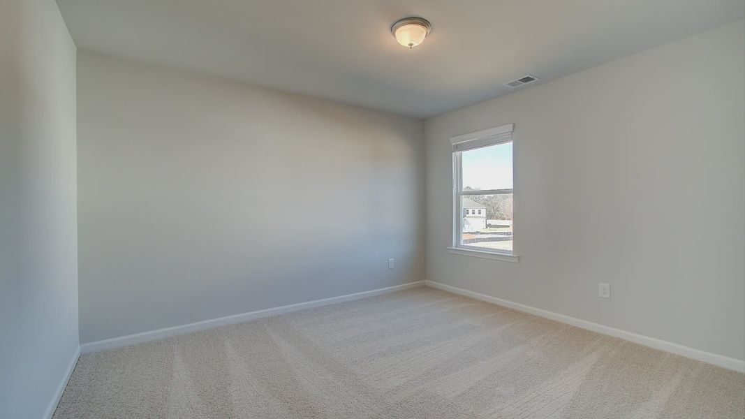 Representative furnished interior of a home built from the Pelham by DRB Homes in Cottages of Bearwood, Mount Pleasant (Image 40).