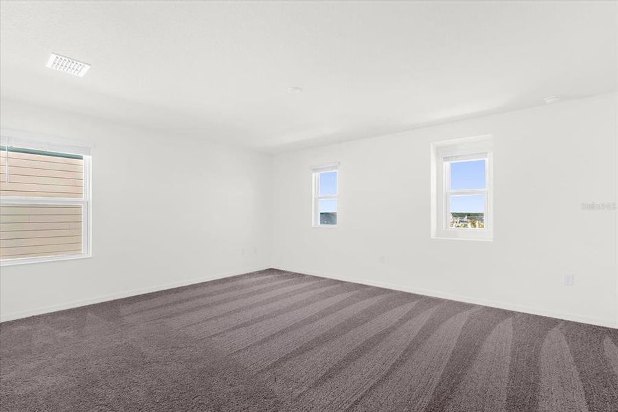 Spacious, unfurnished interior of a new home in Bellaviva III at Westside, Davenport (Image 11).