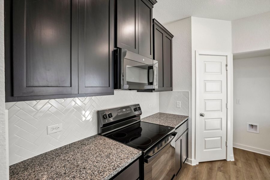 Furnished interior view inside a new home in Rancho San Gabriel, Georgetown (Image 9).