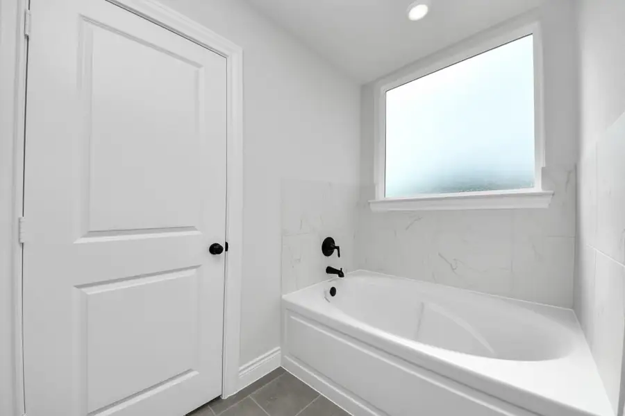 Furnished interior view inside a new home in Lexington Heights, Willis (Image 5).