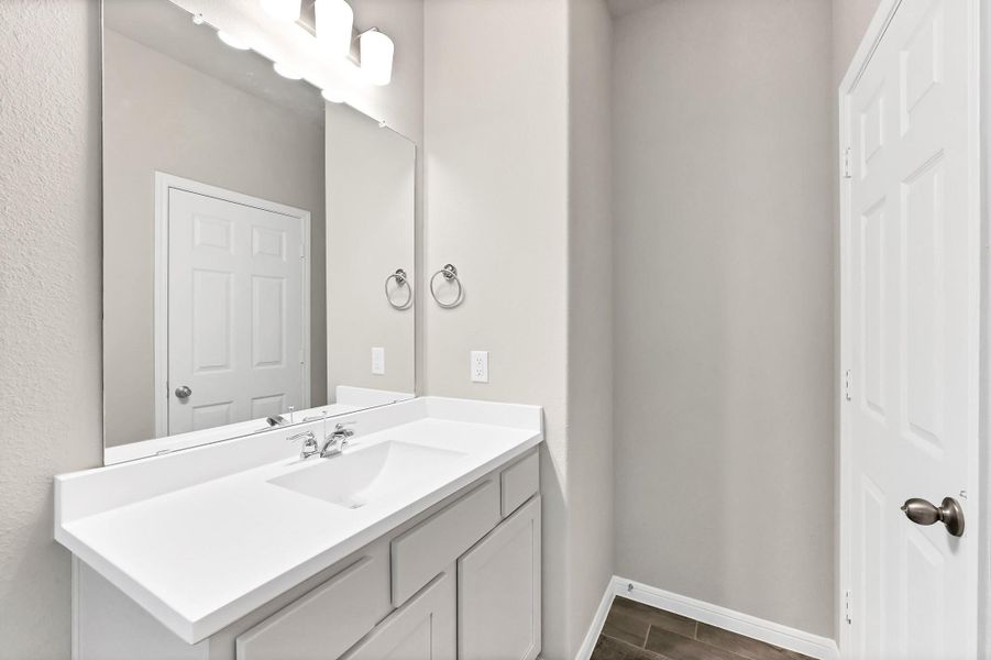 Furnished interior view inside a new home in Enclave at Willis, Willis (Image 9). Furnished interior view inside a new home in Enclave at Willis, Willis (Image 9).