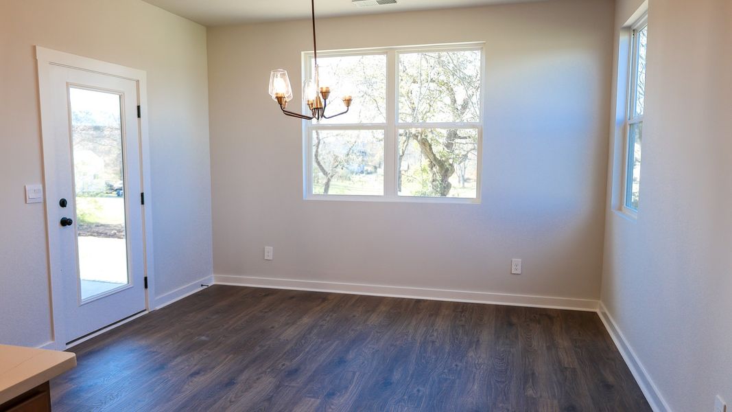 Representative unfurnished interior of a home built from the STONEBROOK II by D.R. Horton in Harvest Point, Spring Hill (Image 39).