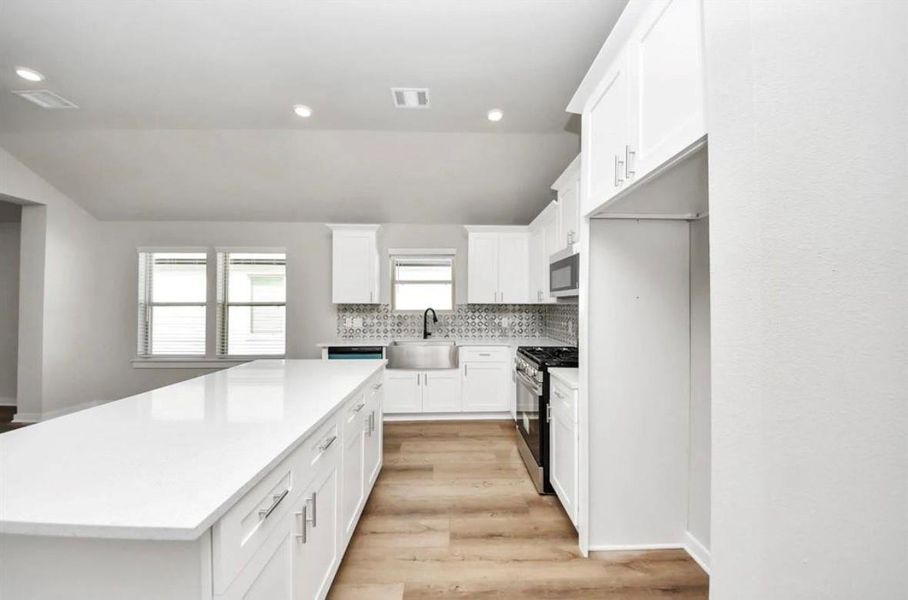 Furnished interior view inside a new home in , Manvel (Image 8).