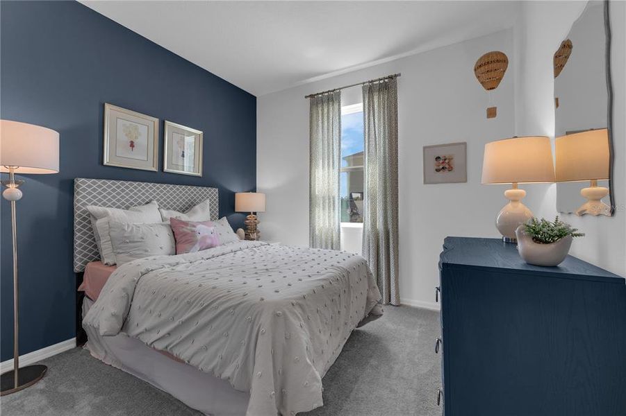 Furnished interior view inside a new home in Covered Bridge at Liberty Bluff, Haines City (Image 8). Furnished interior view inside a new home in Covered Bridge at Liberty Bluff, Haines City (Image 8).