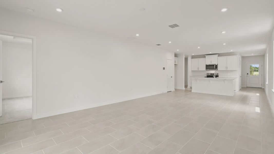 Furnished interior view inside a new home in Grasslands West, Lakeland (Image 19).