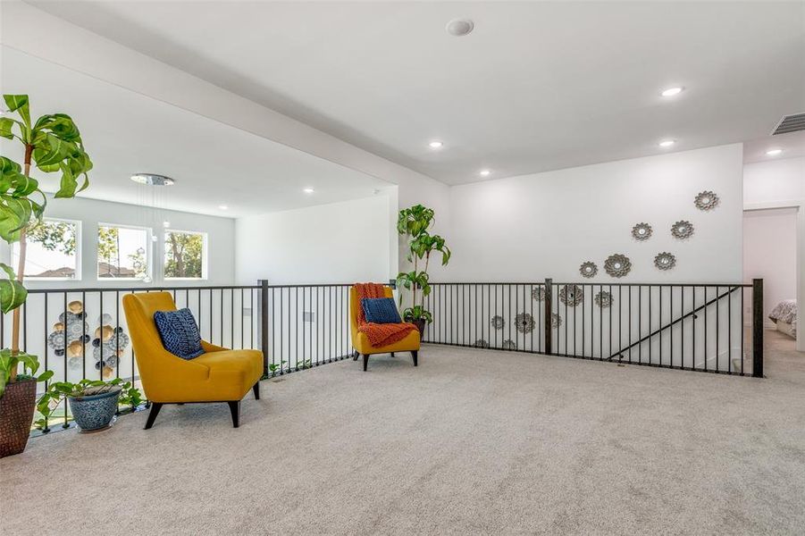 The oversized light and bright game room is the ultimate entertaining space! Featuring plush carpet, luxury blinds, and recessed lighting, it’s perfect for game nights, movie marathons, or a cozy hangout with family and friends. The oversized light and bright game room is the ultimate entertaining space! Featuring plush carpet, luxury blinds, and recessed lighting, it’s perfect for game nights, movie marathons, or a cozy hangout with family and friends.