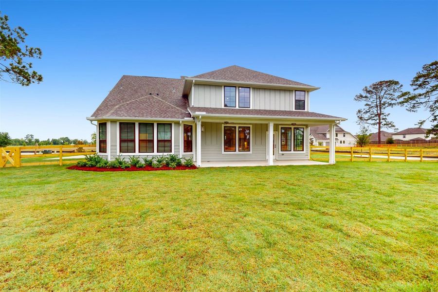 Front exterior of a new home in Sorella, Tomball, TX, highlighting curb appeal (Image 21).