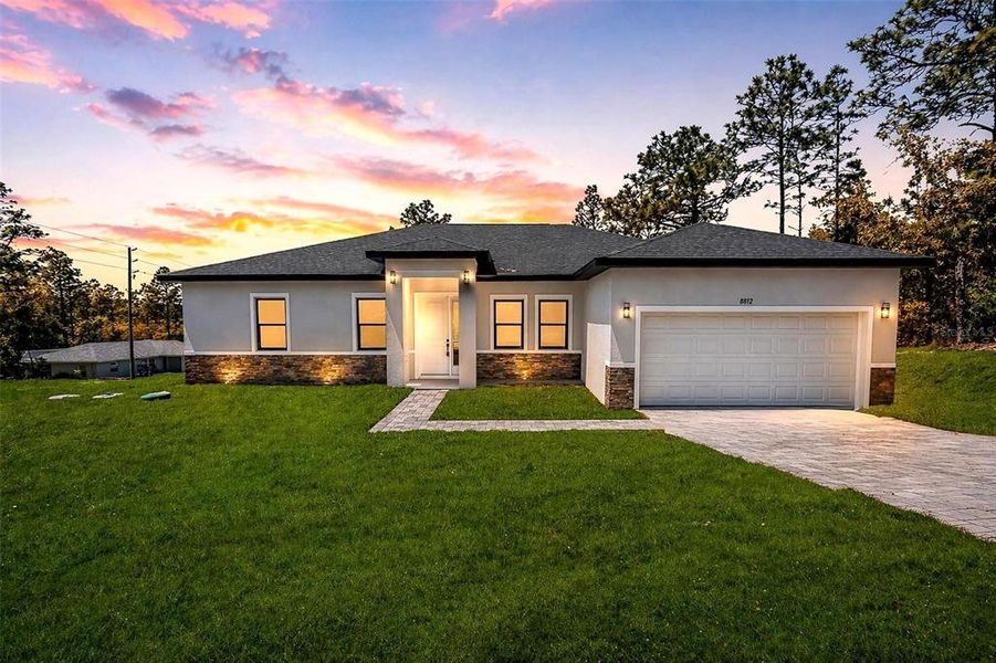 Front exterior of a new home in , Citrus Springs, FL, highlighting curb appeal (Image 22).