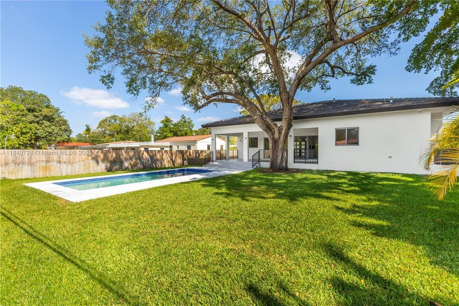 Front exterior of a new home in , Biscayne Park, FL, highlighting curb appeal (Image 23).